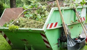 Is there an alternative to hiring a professional garden waste removal service like composting